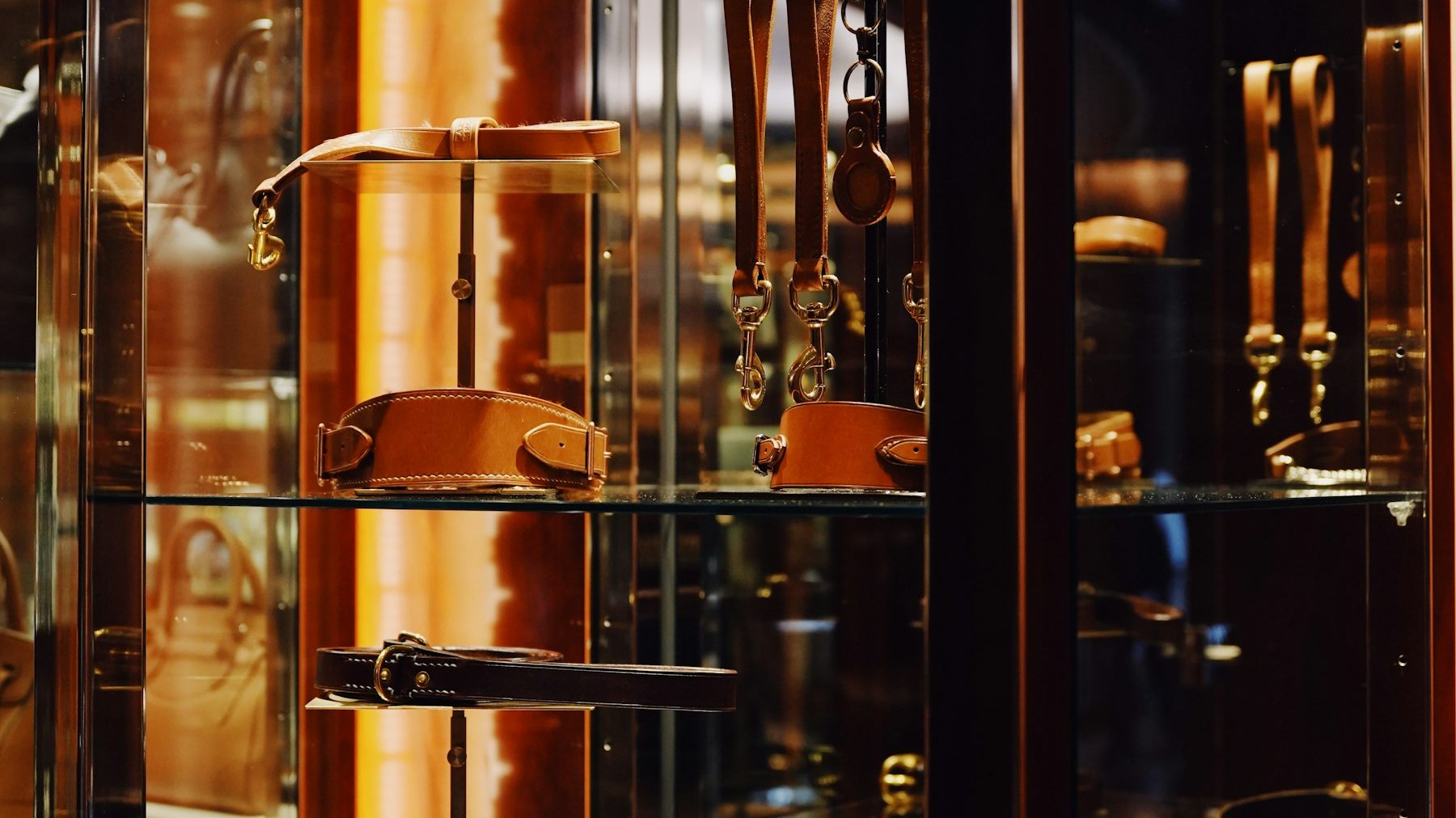 Squarespace to Shopify migration: leather goods displayed in a glass cabinet in a shop