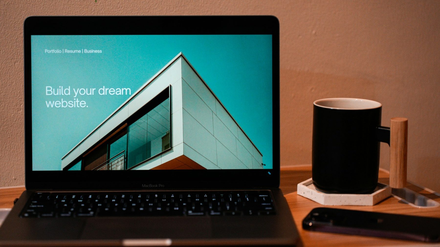 Wix to Shopify migration: a laptop on a wooden desk